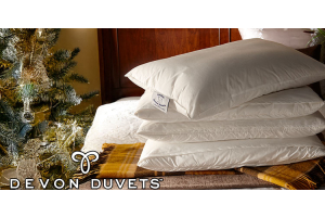 Holiday sleep hack and tips for better festive rest with the Devon Duvets logo.