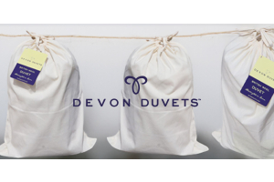 Devon Duvets bagging hanging from a closeline all handmade.