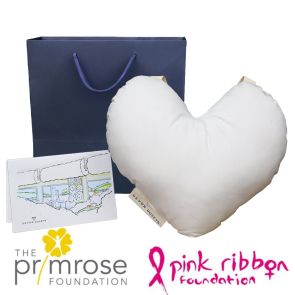 Heart-shaped comfort cushion for breast cancer recovery, handcrafted by Devon Duvets with natural wool filling