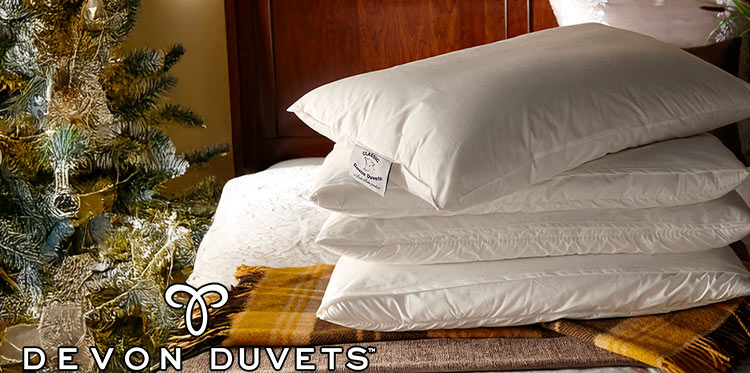 Holiday sleep hack and tips for better festive rest with the Devon Duvets logo.