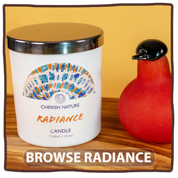 Radiance lifestyle shot - Uplifting scene with glowing candles and bright, revitalising decor for an energised atmosphere.