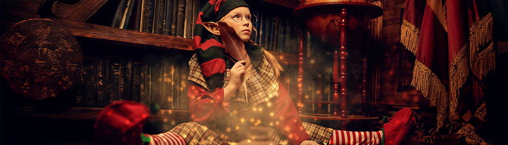 A whimsical scene featuring a young elf wearing glasses, a red and green striped hat, and plaid clothing, sitting in a cosy library setting with warm, magical golden lights floating in the air. The elf holds a feather quill, lost in thought, surrounded by