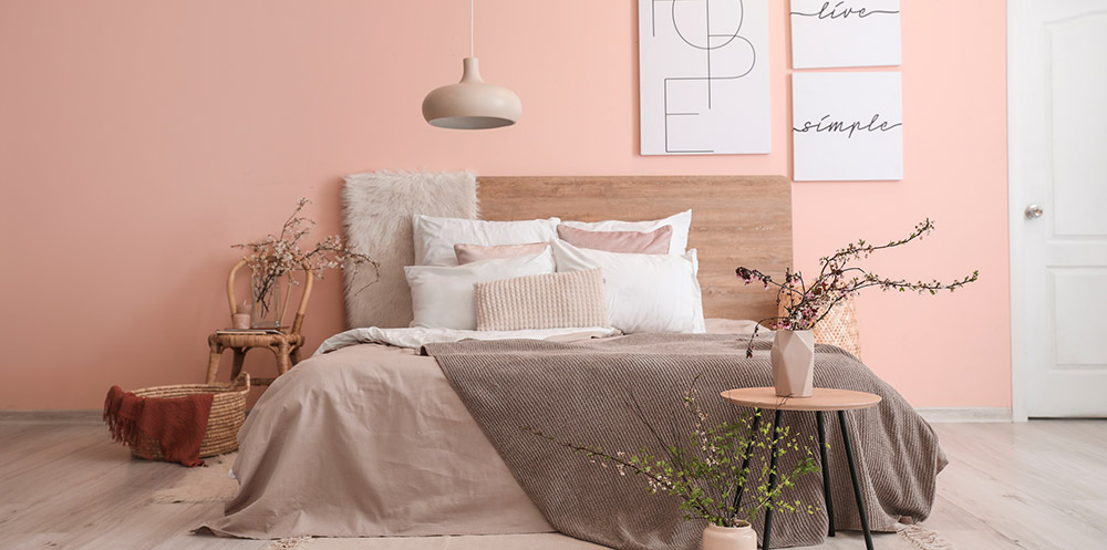 Pink bedroom with relaxing decor and chilled vibe