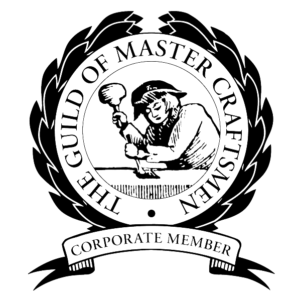 Black and white Guild of Master Craftsmen logo featuring a craftsman with a hammer.